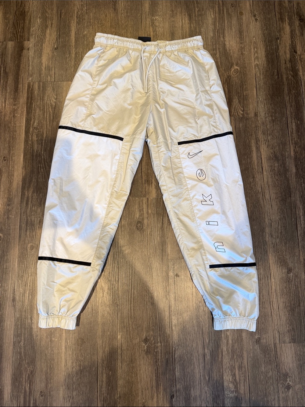 Nike White Joggers with Black Piping and Reflective Logo